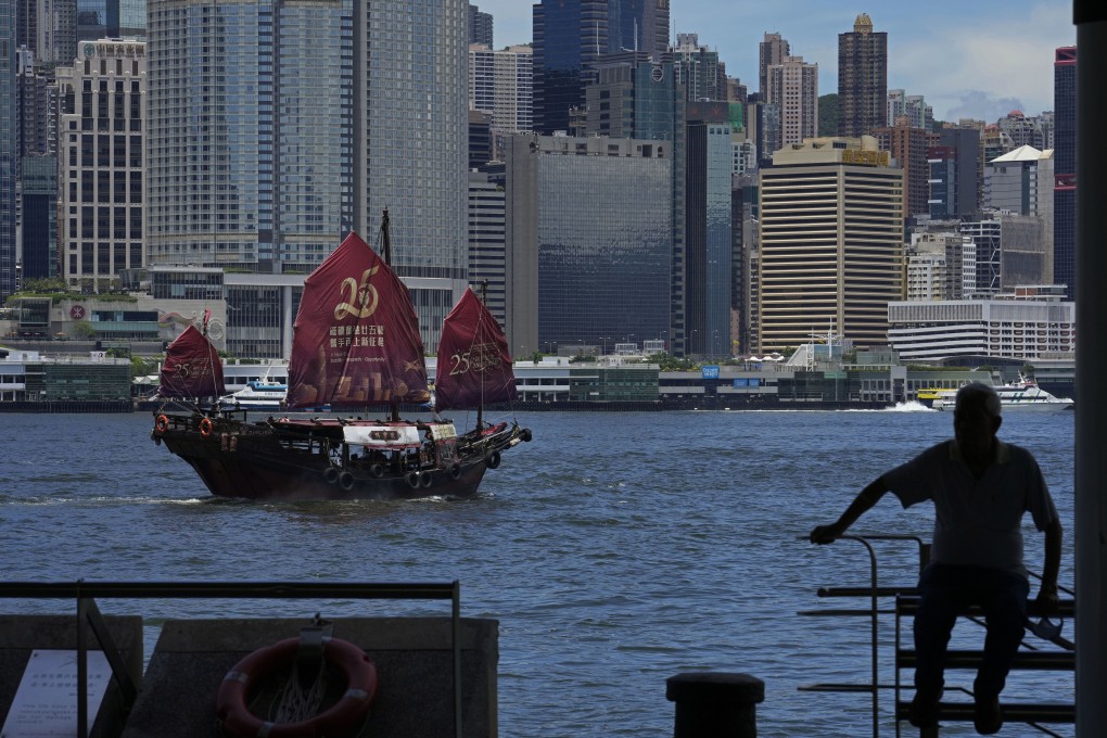 A Chinese junk sails across Victoria Harbour to mark the 25th anniversary of Hong Kong’s return to Chinese rule. Photo: AP