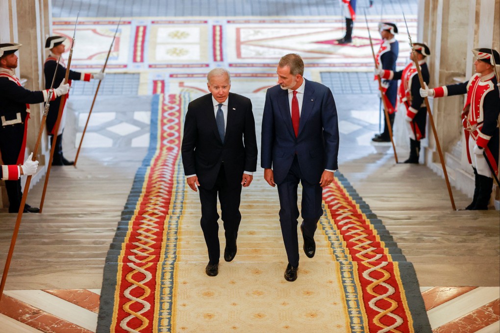 US President Joe Biden walks with King Felipe VI of Spain at the Royal Palace in Madrid ahead of the NATO summit on Tuesday. Photo: Reuters