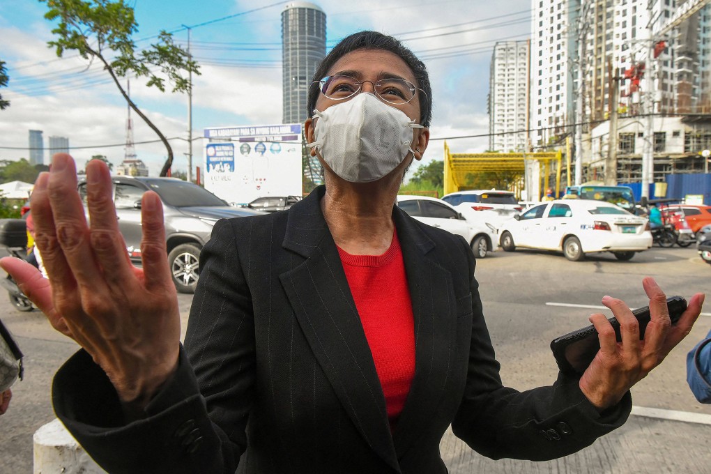 Philippine journalist Maria Ressa, who co-founded Rappler, speaks to members of the media as she arrives at a court in Manila last year. Photo: AFP