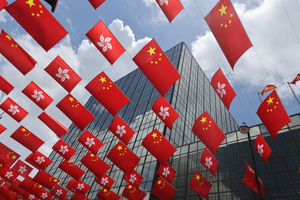 National and Hong Kong flags on display in East Tsim Sha Tsui. Photo: May Tse