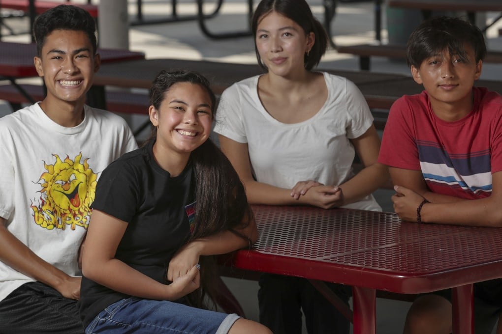 Four children with an Asian and a Latino parent, (from left) Mathew Sy, Emiko Hernandez, Emily Liu, at Mark Keppel High School in Alhambra, California. Photo: TNS