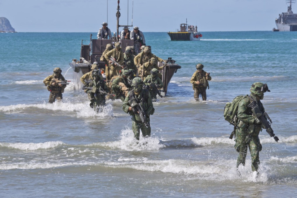 Australian soldiers disembark from a landing craft during a military training exercise with their Singapore counterparts in 2014. Photo: Australian Department of Defence Handout