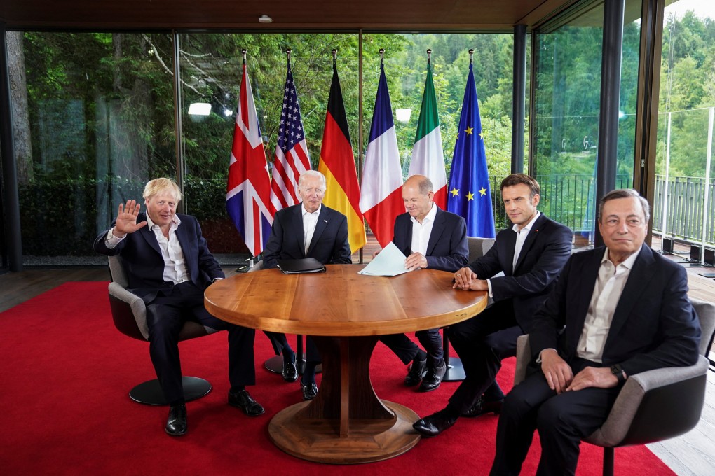 Boris Johnson, Joe Biden, Olaf Scholz, Emmanuel Macron and Mario Draghi during a meeting alongside the G7 leaders summit in Germany. Photo: Reuters