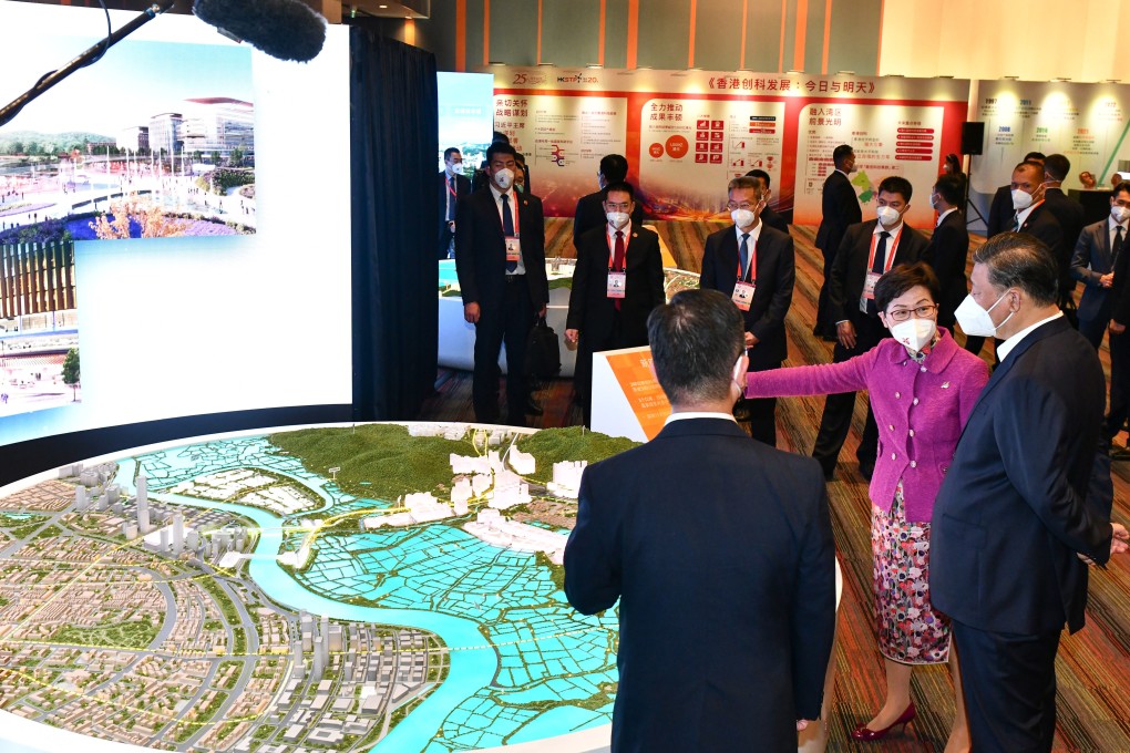 President Xi Jinping (right), accompanied by Chief Executive Carrie Lam, is briefed by Secretary for Innovation and Technology Alfred Sit on Hong Kong’s I&T strengths. Photo: Handout