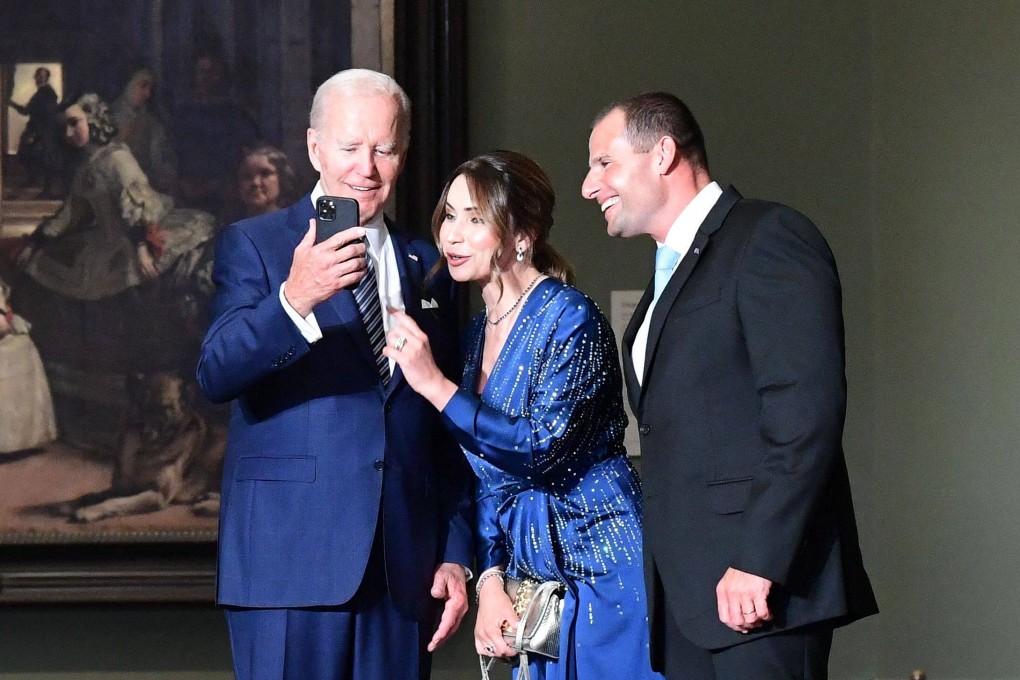 US President Joe Biden takes a selfie with Maltese Prime Minister Robert Abela and his wife Lydia Abela before dinner. Photo: AFP