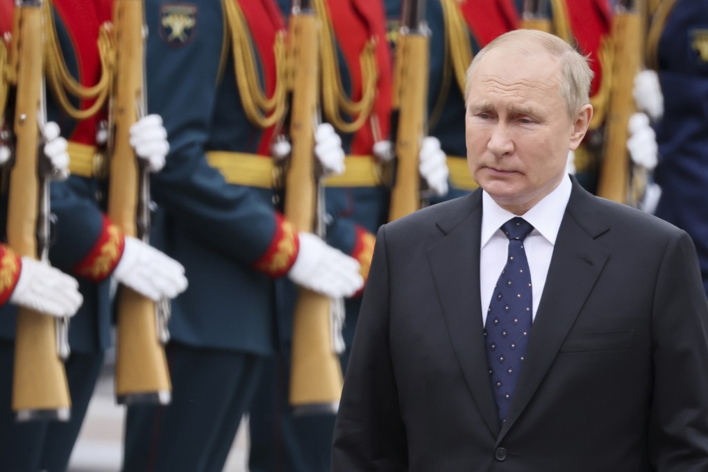 Russian President Vladimir Putin attends a wreath-laying ceremony at the Tomb of Unknown Soldier in Moscow on June 22. Photo: Sputnik via AP