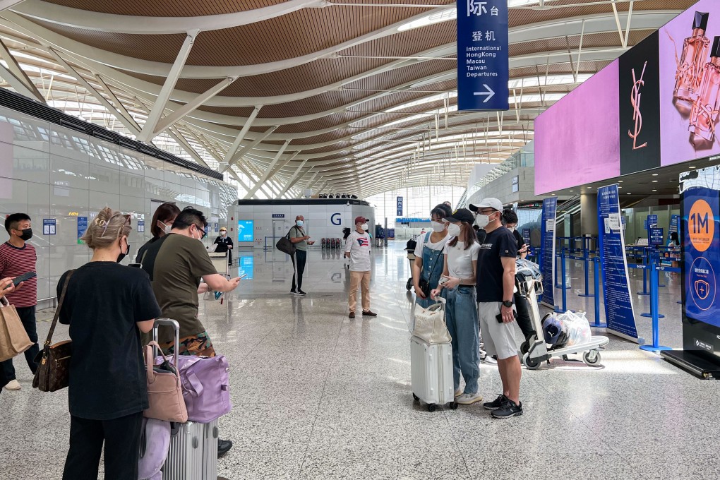 Travellers bid farewell to friends and family at Shanghai Pudong airport. Photo: SCMP/ Ann Cao
