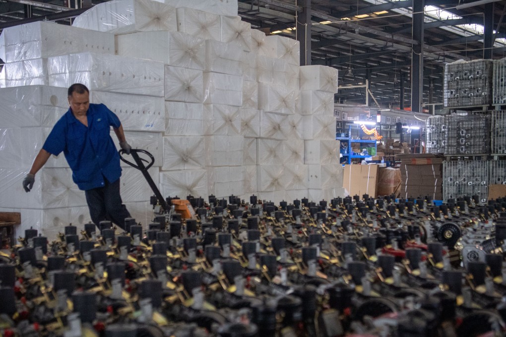 A man works at a machinery factory in southwest China’s Chongqing municipality on May 27. Inland cities such as Chongqing, Wuhan and Xian will be central to maintaining China’s growth momentum as the government tries to bring economic development to regions outside the prosperous east coast. Photo: Xinhua
