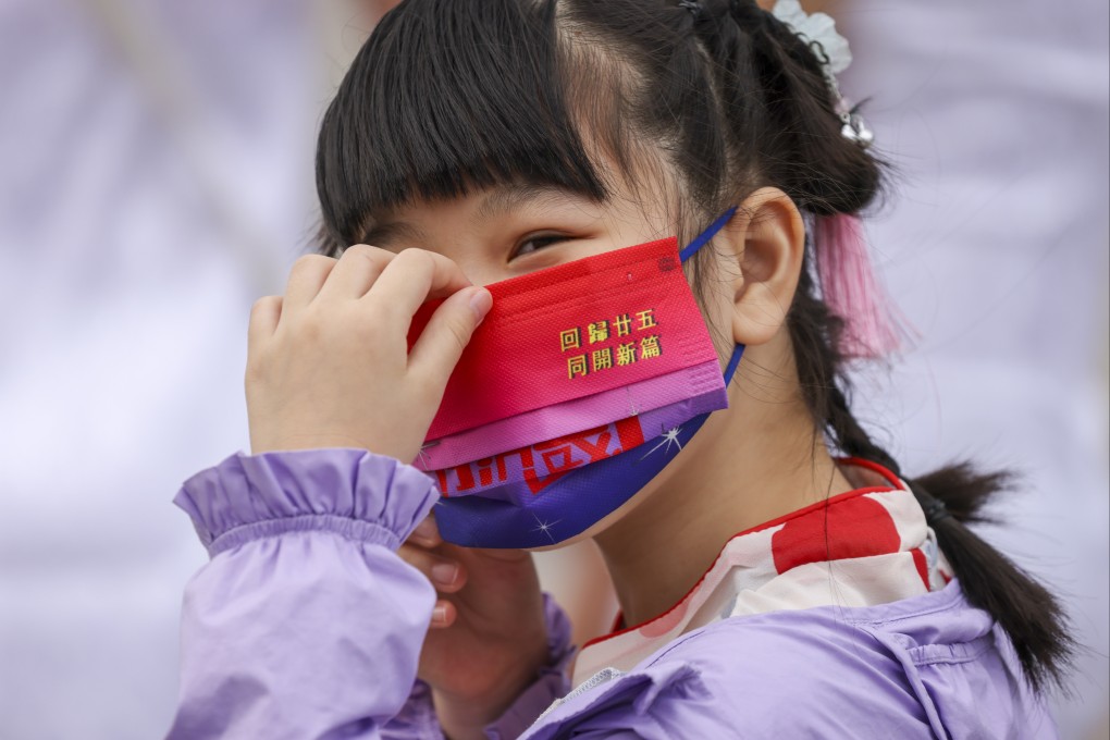 People wearing traditional clothing celebrate the 25th anniversary of Hong Kong’s return to Chinese rule. Photo: Nora Tam