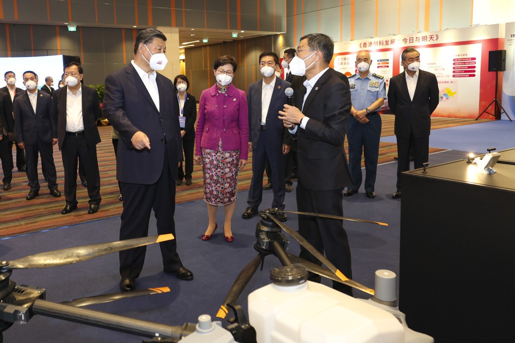 Chinese President Xi Jinping during a visit to the Science Park, accompanied by former Hong Kong leader Carrie Lam. Photo: Xinhua