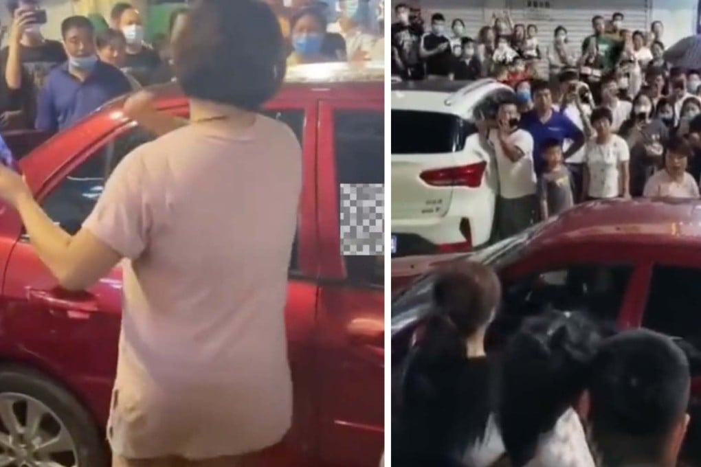 A large crowd cheers for a Chinese woman armed with a brick and her marriage certificate as she confronts her cheating husband and his girlfriend in a car. Photo: Handout