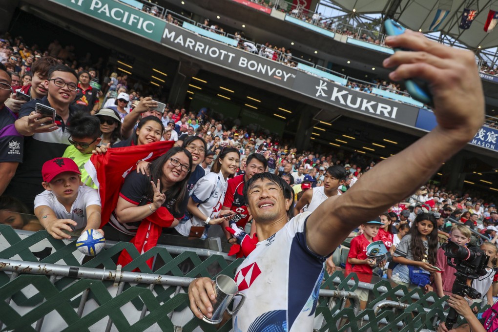 Salom Yiu Kam-shing of Hong Kong takes a selfie with fans after the men’s qualifier final against Ireland on the last day of the Hong Kong Sevens at Hong Kong Stadium on April 7, 2019. The event has been suspended for two years because of the pandemic. Photo: Sam Tsang