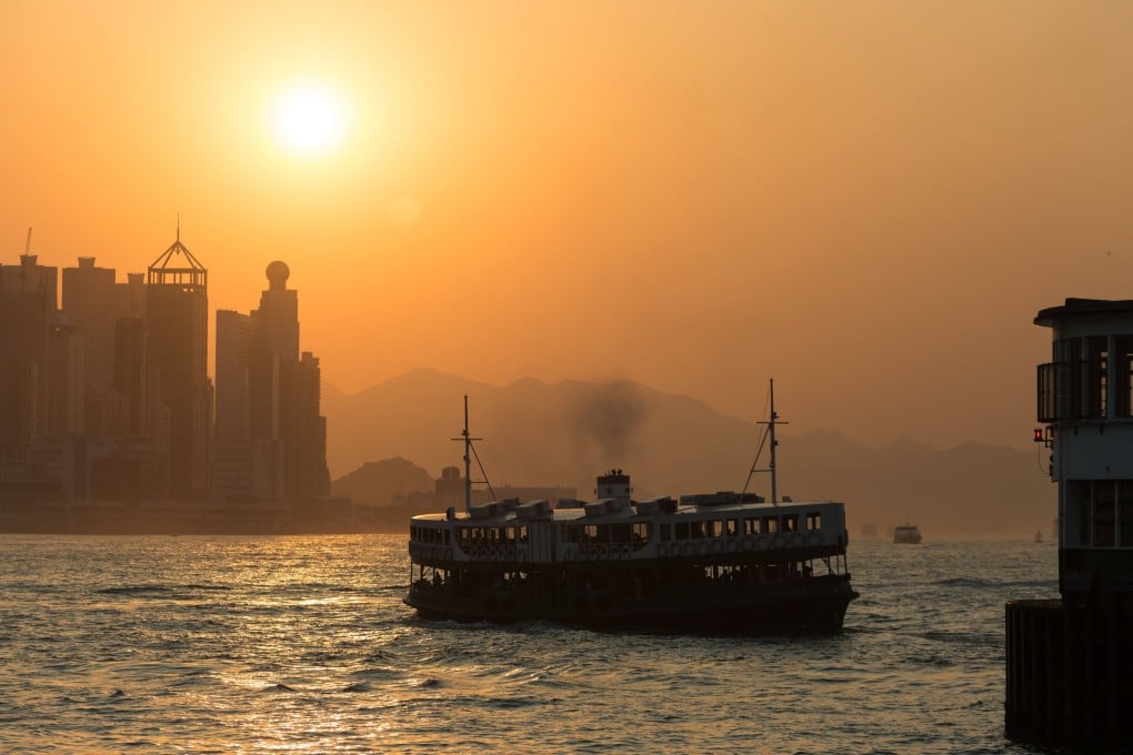 A sunset tour of Victoria Harbour aboard a Star Ferry from Tsim Sha Tsui is an experience to savour. Photo: EPA
