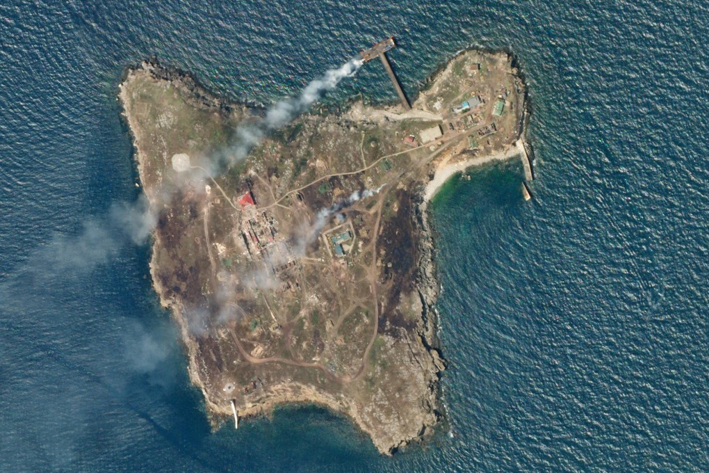 A satellite image shows smoke rising from Snake Island, off the coast of Ukraine, on June 29, 2022.  Photo: Planet Labs PBC