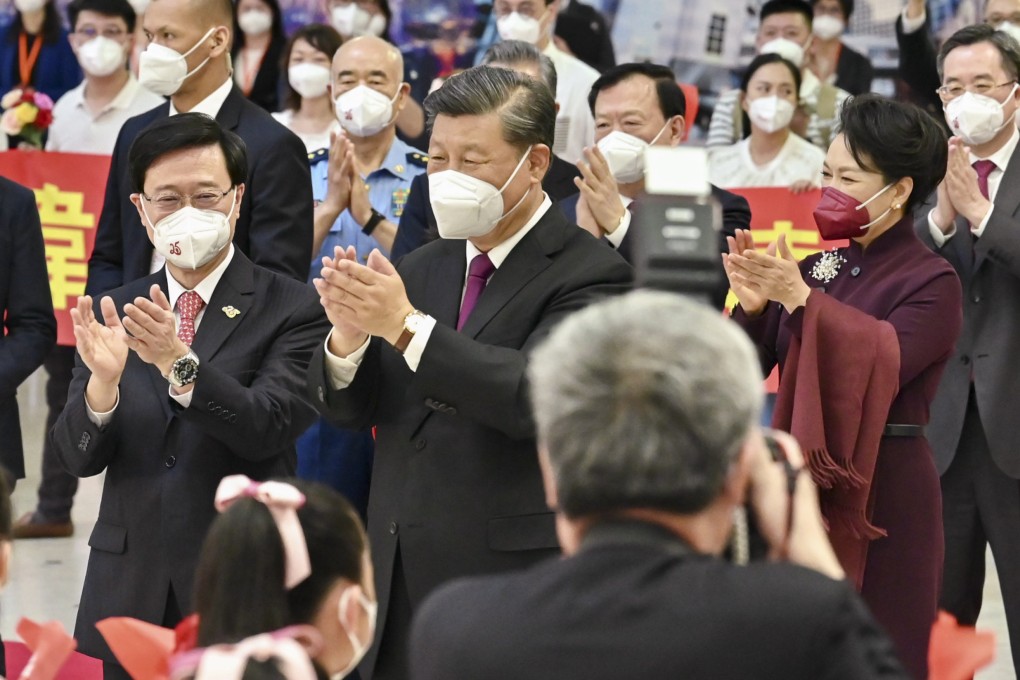 President Xi Jinping and his wife Peng Liyuan, with Hong Kong’s new Chief Executive John Lee, show their appreciation to students seeing them off at the West Kowloon Station after concluding their visit in Hong Kong on July 1, 2022. Photo: ISD