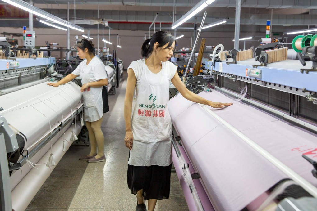 China’s Caixin/Markit manufacturing purchasing managers’ index (PMI) rose to 51.7 in June from 48.1 in May, data released on Friday showed. Photo: AFP