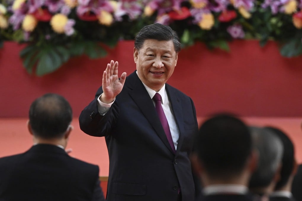 China’s President Xi Jinping waves following his speech after a ceremony to inaugurate the city’s new government in Hong Kong on Friday on the 25th anniversary of the city’s handover from Britain to China. Photo: Pool via AP