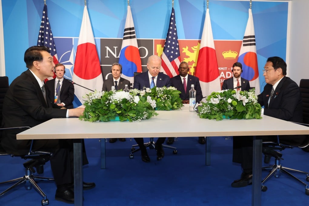South Korean President Yoon Suk-yeol speaks during a meeting with US President Joe Biden and Japanese Prime Minister Fumio Kishida in Madrid, Spain, on June 29. Photo: EPA-EFE