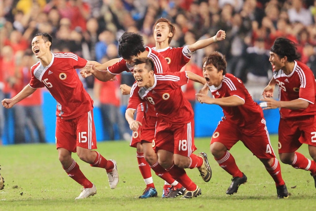 Hong Kong players celebrate after the deciding penalty in their shootout win over Japan in the 2009 East Asian Games’ gold medal match. Photo: SCMP