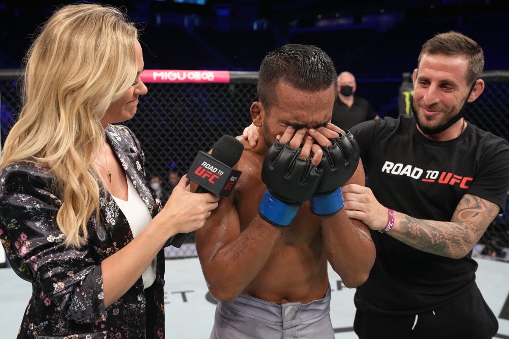 Alex Schild (right) congratulates Topnoi Kiwram after his victory over Yuma Horiuchi in their flyweight fight during this month’s Road to UFC event in Singapore. Photo: Zuffa LLC