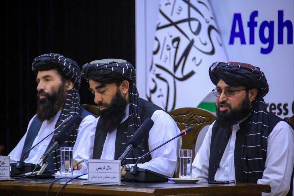 Taliban spokesmen talk to journalists as they brief them about the Loya Jirgas assembly in Kabul, Afghanistan on Thursday. Photo: EPA-EFE