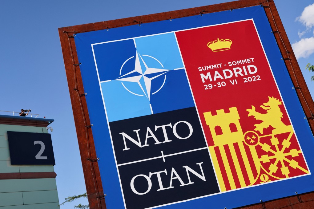 A sign at the Madrid Fair before a NATO summit in Spain, June 27, 2022. Photo: Reuters