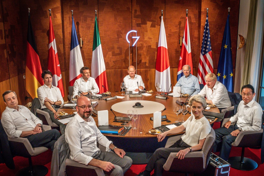 Clockwise from left: Italian Prime Minister Mario Draghi, Canadian Prime Minister Justin Trudeau, French President Emmanuel Macron, German Chancellor Olaf Scholz, US President Joe Biden, Uk Prime Minister Boris Johnson, Japanese Prime Minister Fumio Kishida, European Commission Preisdnet Ursula von der Leyen and European Council President Charles Michel attend the working dinner at the G7 Summit at Schloss Elmau on June 26. Photo: dpa