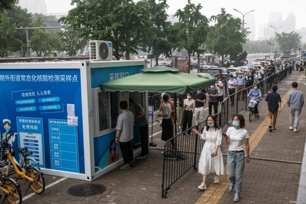 Beijing residents also have to get tested every three days and show a negative result to enter public venues. Photo: Bloomberg