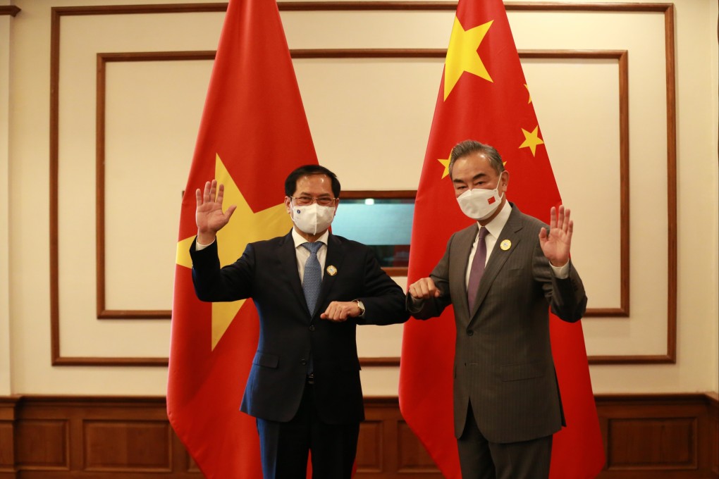 Chinese State Councillor and Foreign Minister Wang Yi, right, meets Vietnamese Foreign Minister Bui Thanh Son on the sidelines of the seventh Lancang-Mekong Cooperation (LMC) foreign ministers’ meeting in Bagan, Myanmar, on July 4, 2022. Photo: Xinhua