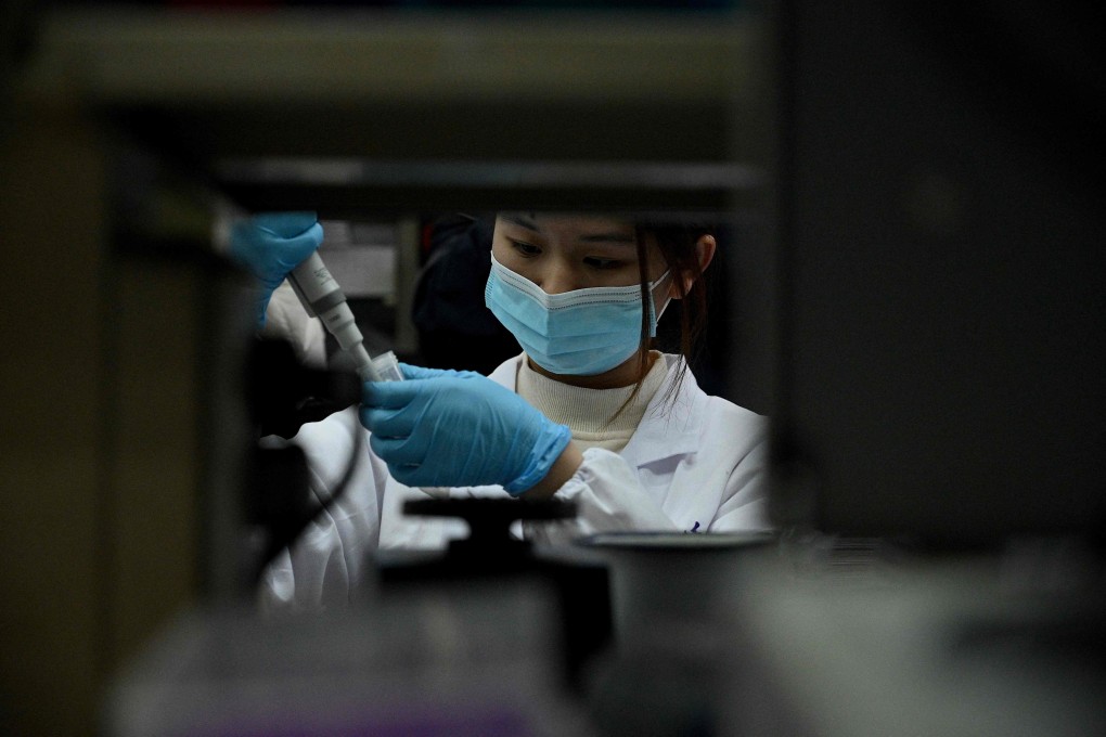 A laboratory technician works at a Tsinghua University lab in Beijing. Brii, Tsinghua University and the Third People’s Hospital of Shenzhen have co-developed a monoclonal neutralising antibody therapy. Photo: AFP