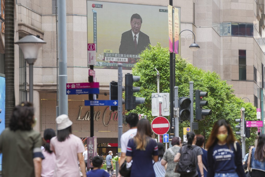 A screen in Causeway Bay shows a live broadcast of President Xi Jinping’s 25th anniversary speech on July 1. Photo: Sam Tsang