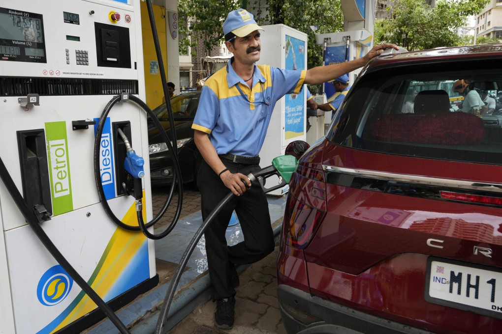 A Bharat Petroleum employee fills up a vehicle at a petrol station in Mumbai on June 11. India and other Asian nations are becoming an increasingly vital source of oil revenue for Moscow as the US and other Western countries cut their energy imports from Russia in line with sanctions over its war in Ukraine. Photo: AP