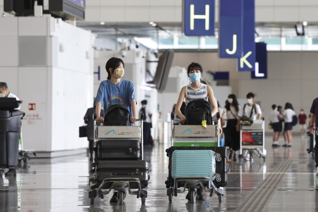 Travellers in the departure hall at Hong Kong International Airport on June 22, 2022. Photo: SCMP