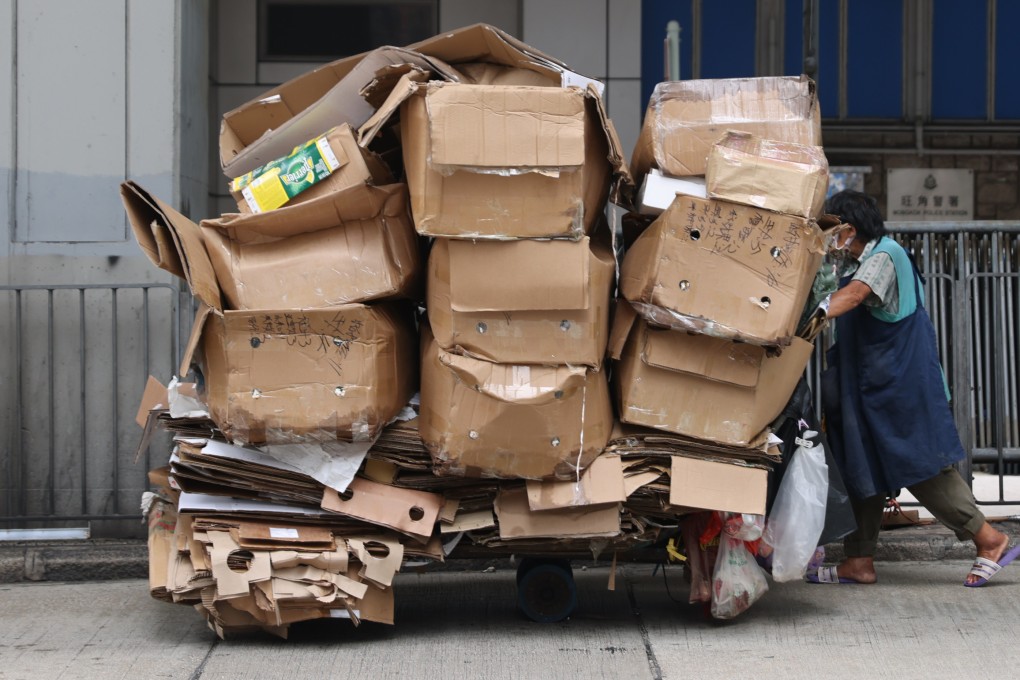 An elderly person pushes a trolley of used boxes in Mong Kok on June 19. Addressing the city’s growing wealth inequality is an urgent task for the new administration. Photo: Nora Tam
