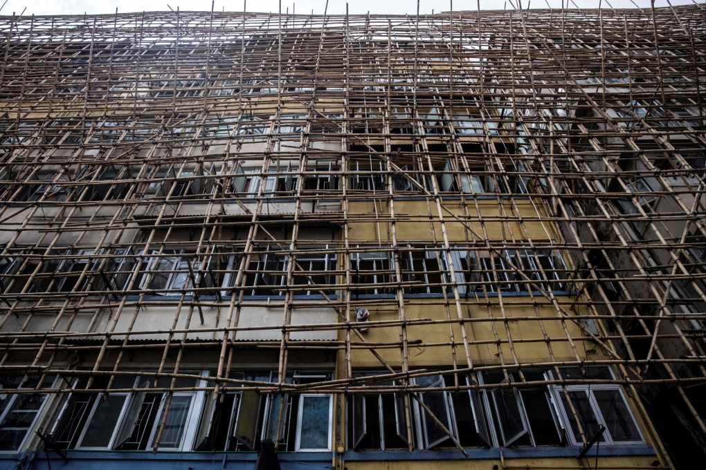 Bamboo scaffolding covers an old residential building in Hong Kong that will be pulled down and replaced with new flats, seen on March 18. Photo: AFP