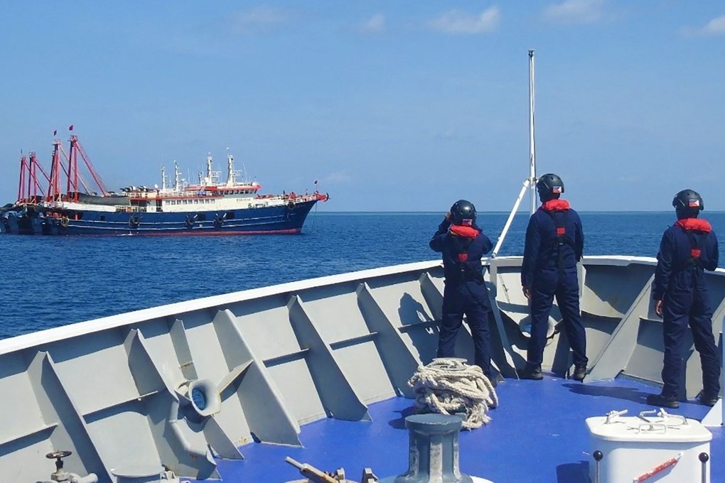 Philippine coastguard  monitor Chinese vessels near a disputed shoal in the South China Sea. Photo: AFP
