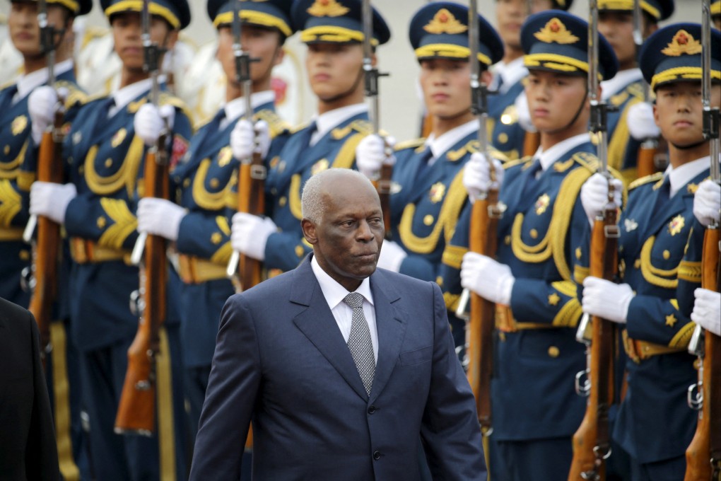 Angola’s President Jose Eduardo Dos Santos inspects the honour guard during a welcoming ceremony outside the Great Hall of the People in Beijing in June 2015. Photo: Reuters