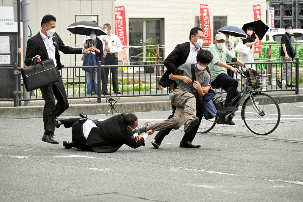 Police at the shooting scene arrested Tetsuya Yamagami on suspicion of murder. Photo: EPA-EFE/The Asahi Shimbun