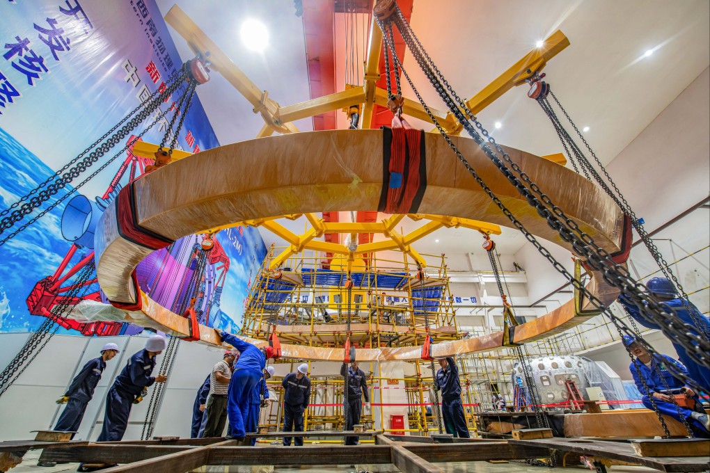 Staff of China National Nuclear Corporation’s Southwestern Institute of Physics work on the installation of the HL-2M Tokamak, China’s new-generation “artificial sun,” in Chengdu in southwest China’s Sichuan province on September 16, 2019. Photo: Xinhua