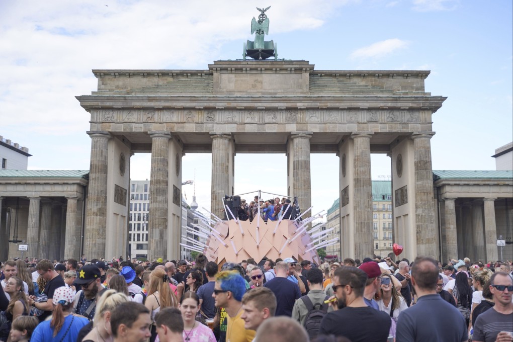 People take part in the Rave the Planet parade in Berlin, Germany on Saturday. Photo: DPA via AP