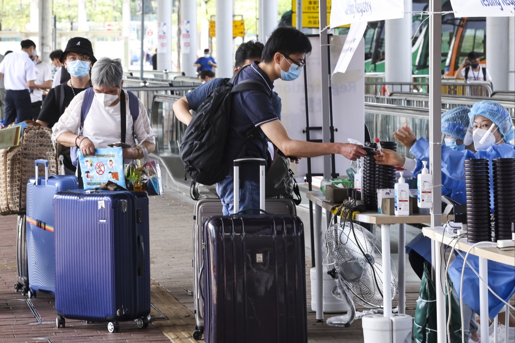 A queue for a Covid-19 test at Shenzhen Bay border in April. Photo: SCMP/K. Y. Cheng
