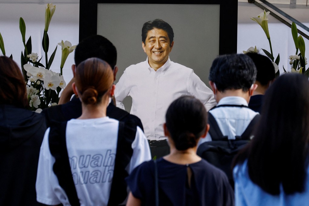 The three-pronged approach adopted by former Japanese prime minister Shinzo Abe has long been cited by Chinese policy advisers as a warning against unconventional policy loosening even before Friday’s assassination. Photo: Reuters