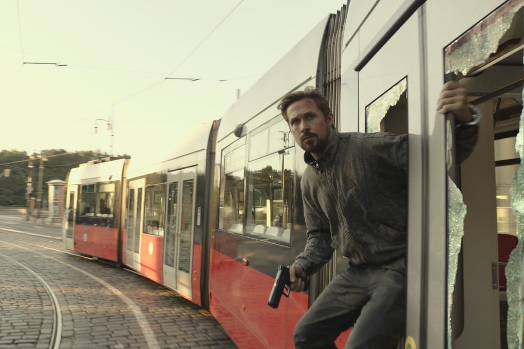 Ryan Gosling plays a CIA operative in a still from Netflix movie The Gray Man. Photo: Netflix.