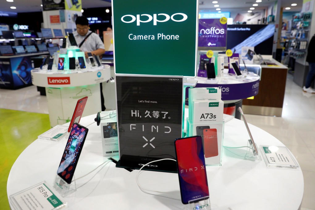 Oppo smartphones displayed in a shop in Singapore on August 8, 2018. Photo: Reuters