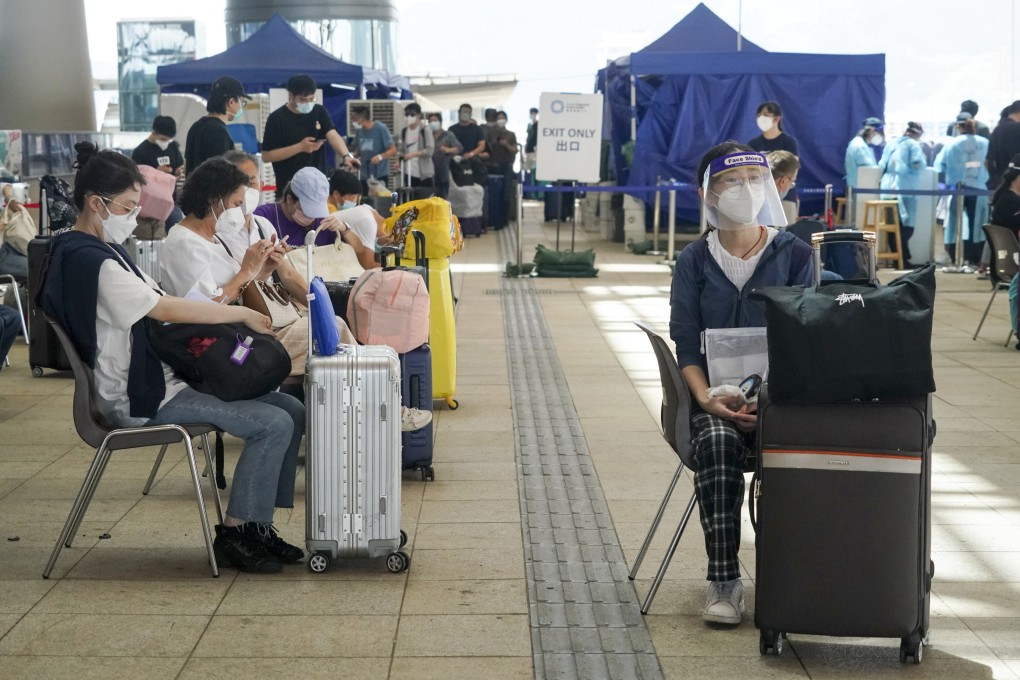 An outbound traveller wait for COVID-19 test at the Hong Kong-Zhuhai-Macao Bridge (Hong Kong Port).
23JUN22 SCMP / Felix Wong