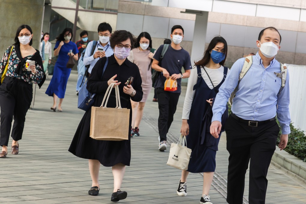 Hong Kong civil servants head to work at the government offices in Tamar on May 18. Photo: Nora Tam