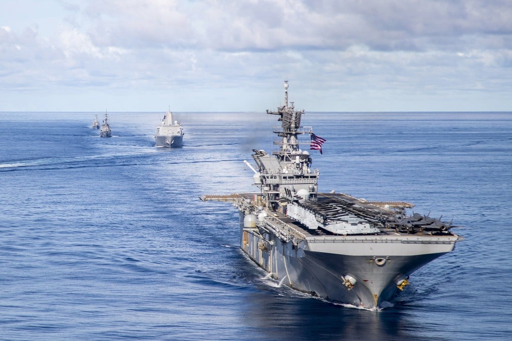 US amphibious assault ships sail alongside Australian and Japanese destroyers and support craft during a joint naval exercise held in the Indo-Pacific last year. Photo: LSIS Ernesto Sanchez/Royal Australian Navy Handout