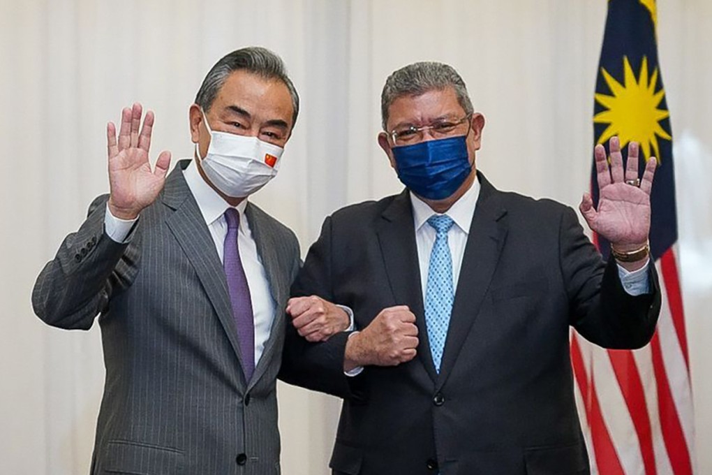 Malaysia’s Foreign Minister Saifuddin Abdullah, right, and China’s Foreign Minister Wang Yi after their meeting in Malaysia on Tuesday. Photo: via AP