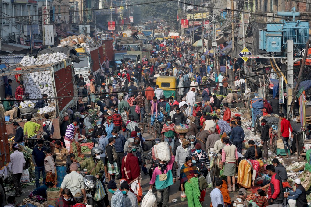 People shop in a crowded market in Kolkata, India in January. Photo: Reuters
