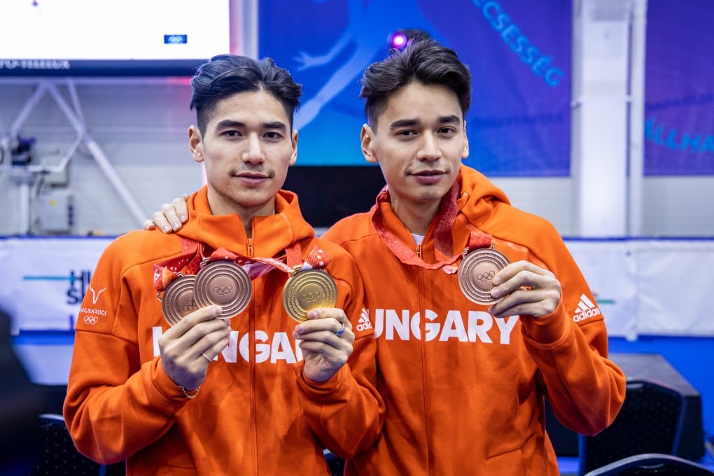 Liu Shaoang (L) and Sandor Liu Shaolin at a welcoming ceremony in Budapest after they returned from the Beijing Winter Olympics. Photo: Xinhua